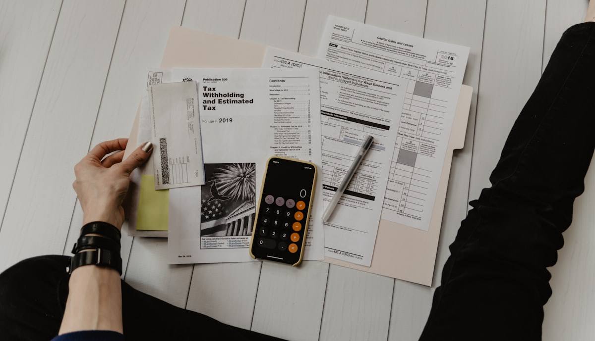 Financial paperwork and a calculator