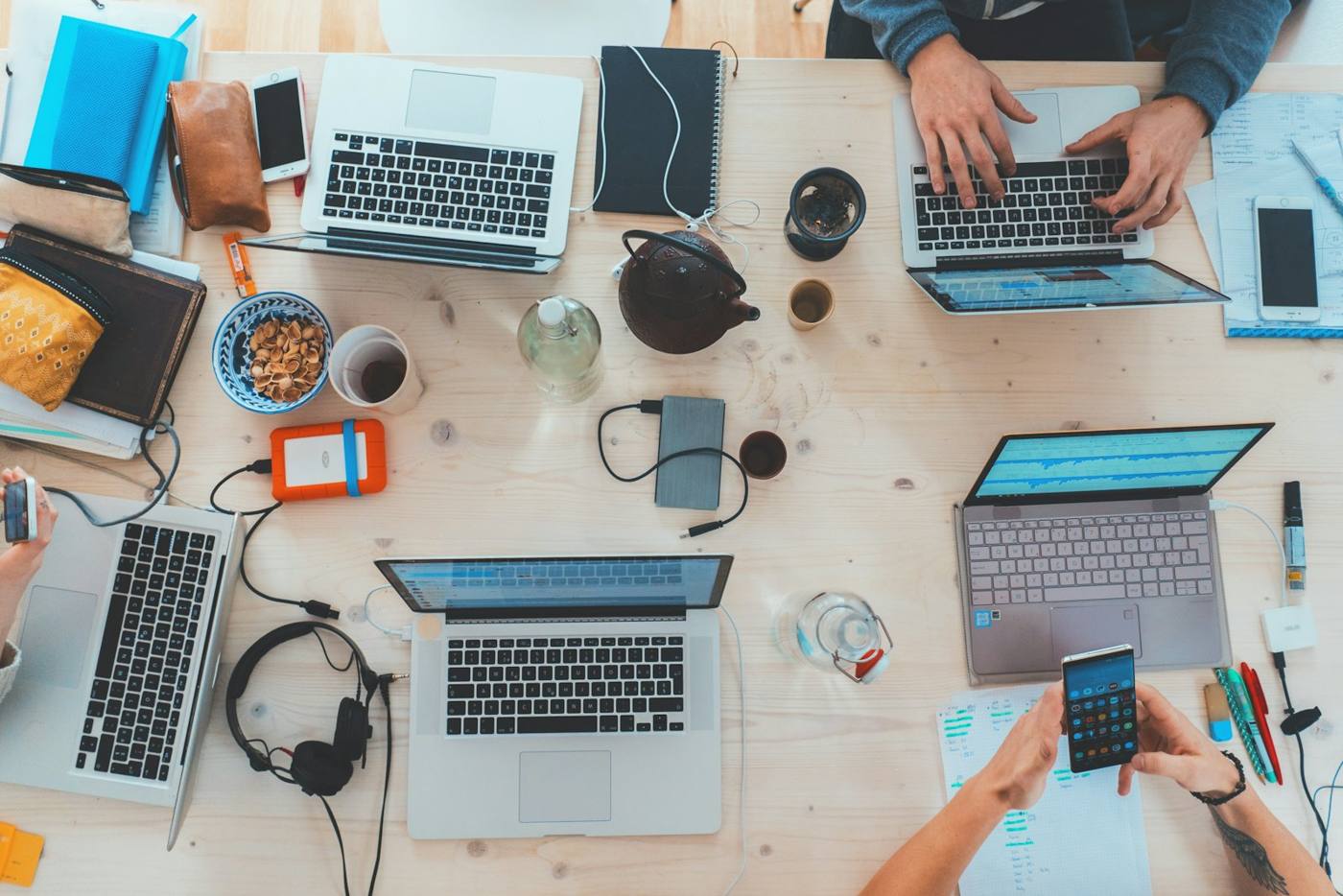 Laptops and devices on a work table